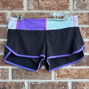 Lululemon athletica shorts black and purple back floral size 6
2.5”